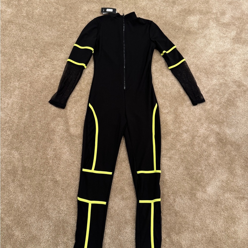 Fashion Nova Women’s Black and Neon Green Footie with mesh on both arms and legs